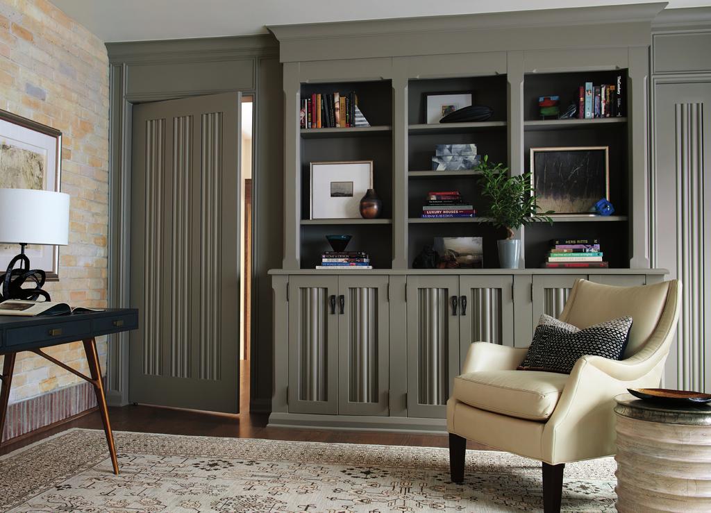 The panels of two TS3010 doors in the study were customized to match the existing linen fold on the cabinetry.