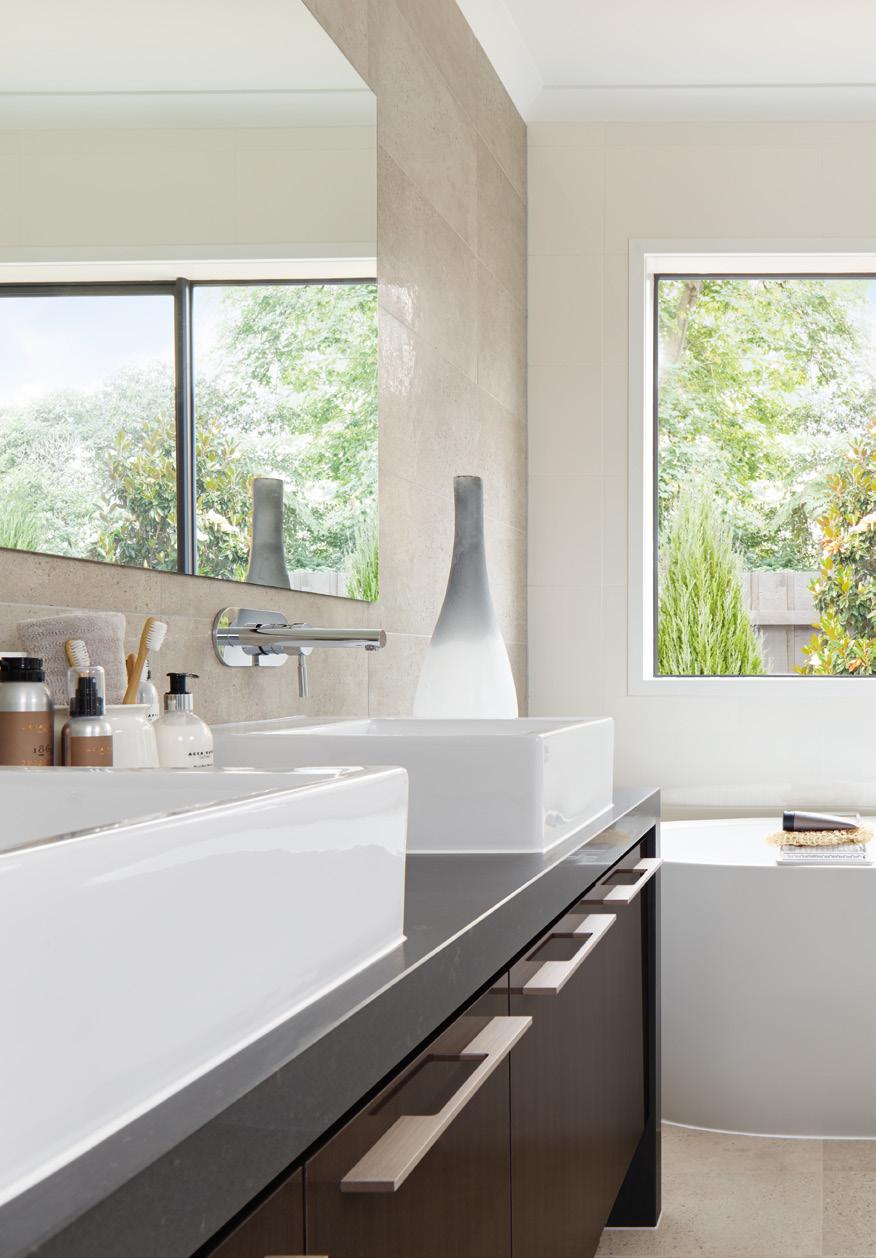 P.14 In your designer bathroom A CAESARSTONE BENCHTOP Set the mood of opulence with your choice from an extensive range of 17 Caesarstone benchtop colours in 40mm edged stone.