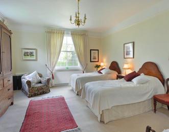 The principal rooms face south and east with wonderful views over the gardens and swimming pool.