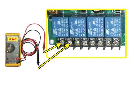 With the Compressor NOT running: 9.3.5 Use a Voltmeter to measure across the board terminals were wires #5 and #6 are connected. The voltage should measure 0 VAC (±10%). 9.3.6 Replace the clear plastic terminal block cover.