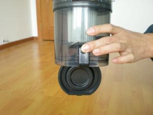 ) Remove dust canister from vacuum by lifting out 3.