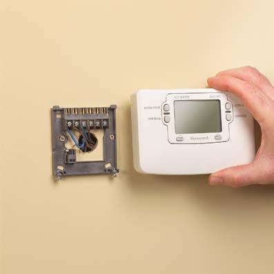 The timer has a wireless receiver built-in. This means that simply by replacing an old timer a thermostat is enabled in a system without having to run any new wiring.