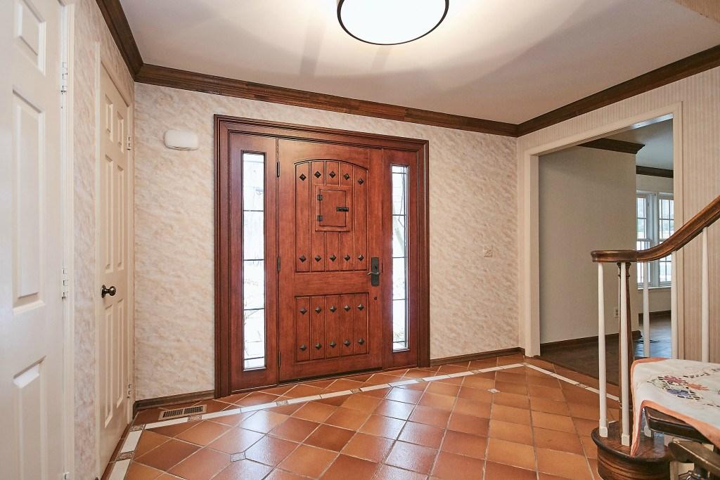 floor, crown molding and 2 coat closets. Located directly off the foyer is the elegant living room.
