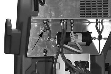 Maintenance Maintaining the Vacuum Pump Checking Vacuum Pump Oil Level 1. Look through oil level sight glass to verify vacuum pump oil level. Figure 6: Master Filter/Dryer 4.