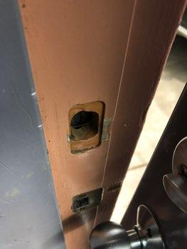 Entry door operates and locks overall.