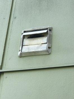 Corrugated metal Paint flaking at the trim, recommend loose paint is removed,