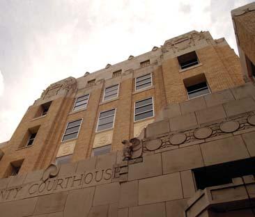 While not a skyscraper, the actual height of the Eastland courthouse is exaggerated by the use of vertical bands.