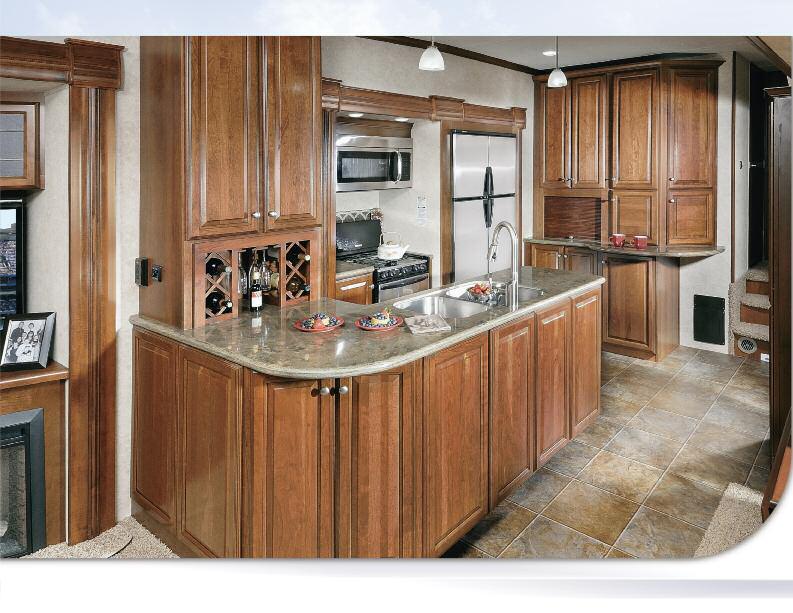 CARDINAL FIFTH WHEELS l The Comforts of Home...Wherever You Are This 3450RL gourmet kitchen is fit for a master chef!