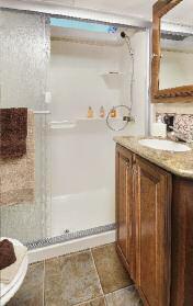 Cardinal s residential style bath features a comfortable 30 x 60 shower with an adjustable shower head and skylight.