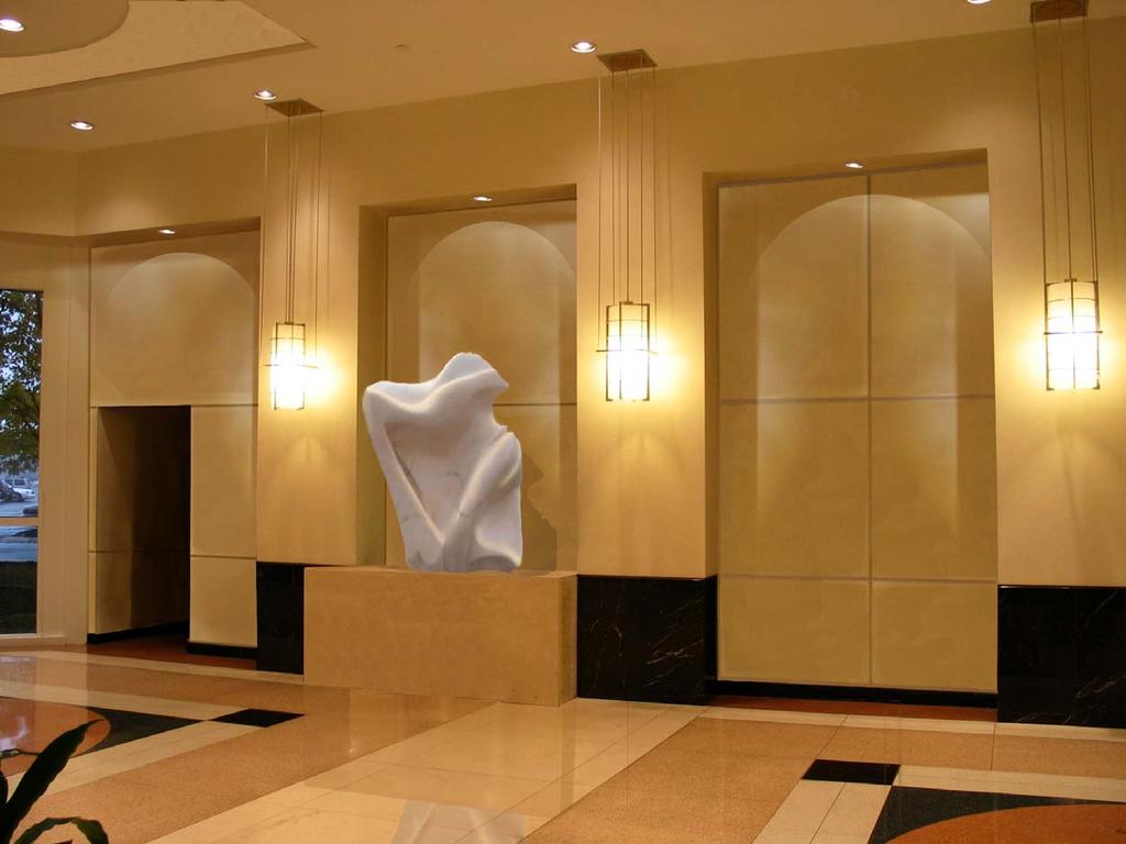 Lobby View-North Wall existing Strategy: Simplify design and reduce level of contrast along with