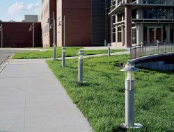 Either bollards or pole mounted fixtures