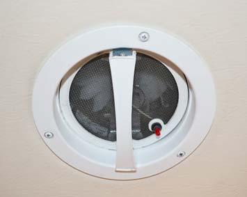 The vent lid will open automatically when the fan is turned on and close when the fan is turned off. IN/OUT Press to reverse the direction of the fan.