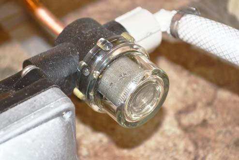 SECTION 7 PLUMBING Shower Filter Screen (Located beneath galley cabinet access panel) -Typical View Shower Valve Pressure Bleed-Off After