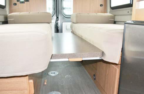 of the driver side twin bed cabinet) to align with the notch on the