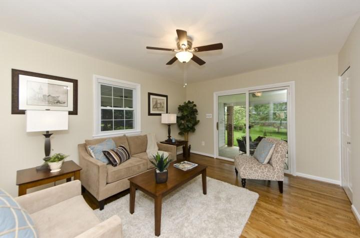 You are welcomed into the home by the entry foyer with coat closet and staircase leading to