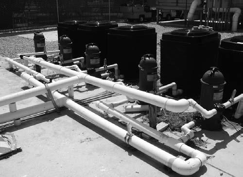 MULTIPLE HEATER INSTALL Multiple heater plumbing must be designed with balancing valves and flow meters to assure at least minimum water-flow to each heater.