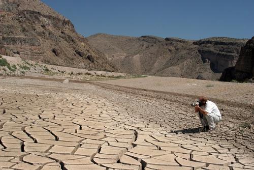 Desertification The conversion of once productive lands into non-productive,