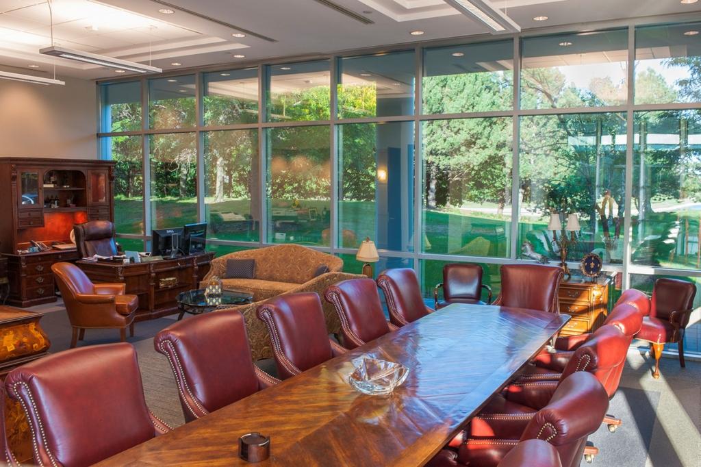 A180.07 Executive Conference Room: Two spaces are combined for the executive office suite