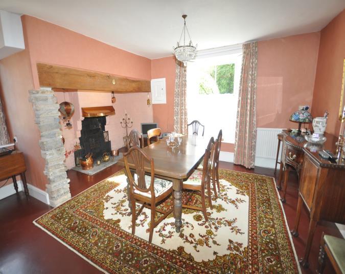 In brief the property comprises an entrance hall, kitchen, dining room, sitting room, living room, utility and WC to the ground floor, whilst to the first floor there are five bedrooms, two bathrooms