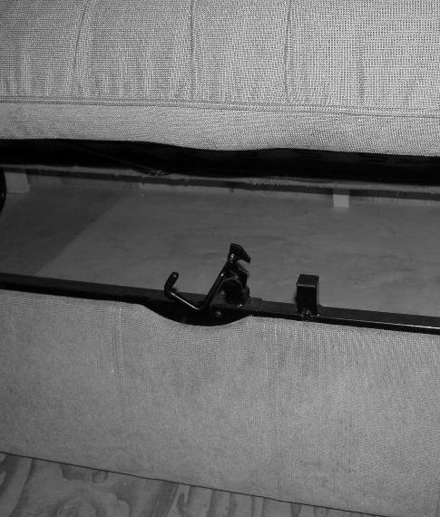 choice by the touch of a button. Sofa to Bed 1. Remove seat back cushions and set aside. Security Latch Handle (Shown with sofa seat lifted) - Press DOWN to release 2.