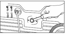 Loosen and remove the three transit bolts.