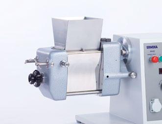 The kneading vessel is fitted with a plexiglas cover to monitor the kneading Wet granulator with oscillating rotor for the production of wet granules.