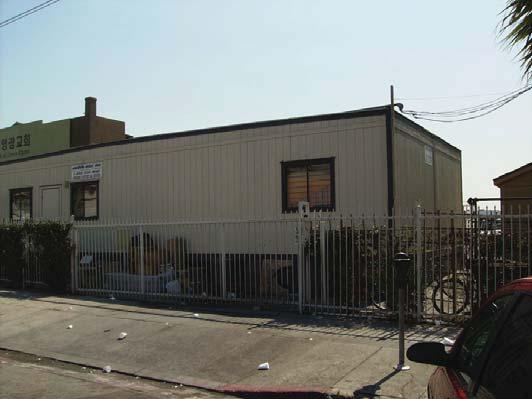 Glory Church of Jesus Christ View 1: View looking northeast from Hope Street toward a modular on the