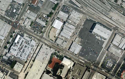 and right background). View 4: View looking southwest across the parking uses on Parcel 3.