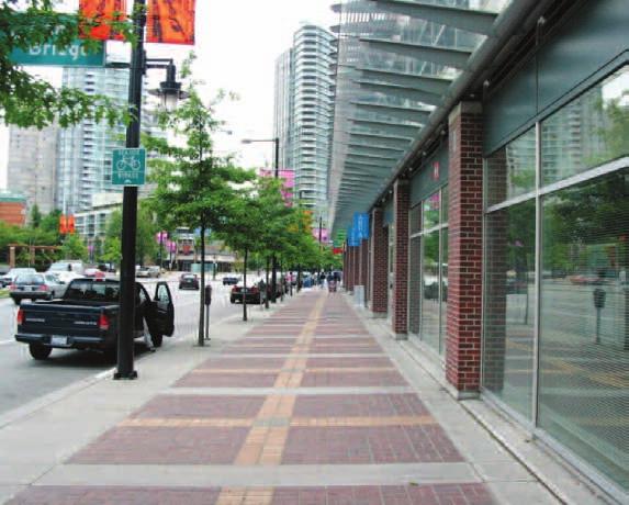 0 metres back from the side property line for corner sites, in order to define the street edge and provide space for pedestrian activities and landscaping (Figure 4).