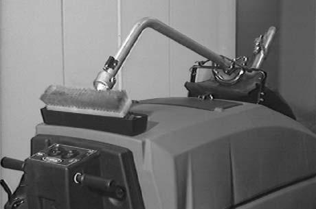 POWER WAND The power wand uses the machine s vacuum and solution systems. The power wand allows scrubbing of floors that are out of reach of the machine.