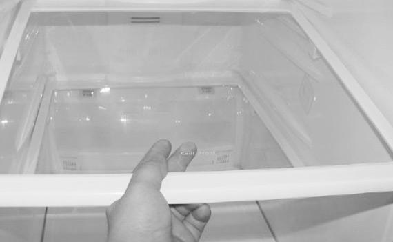 The drawers are located in the lower portion of the refrigerator. 1. Pull out the drawer as far as it goes. 2.