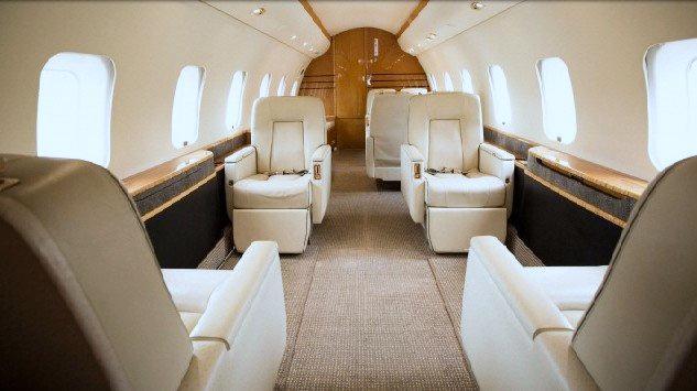 INTERIOR: The beautifully designed interior features 13 passenger executive seating, fwd-place club, mid-cabin 4-place conference group, aft 3-place berthable 16G divan opposite dual executive seats,