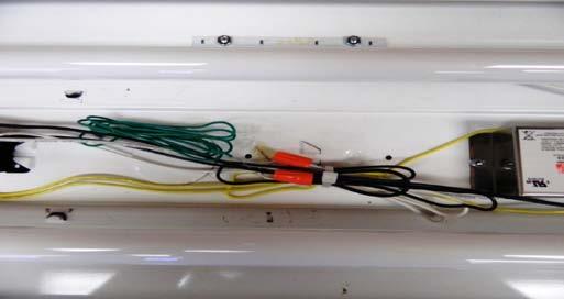 Place the Emergency LED Driver and LED battery pack onto the fixture. See picture #2.