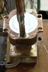 condenser; (c) Needle valve and