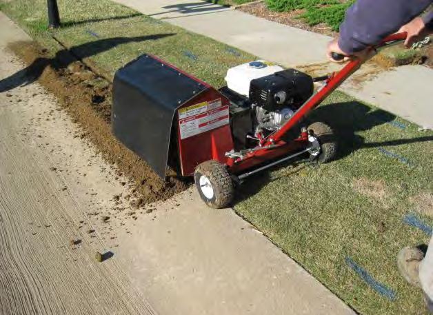 Rotary trencher leaves a small mound of dirt that is