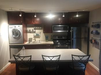 1. Kitchen Room Kitchen Walls and ceilings appear in good condition overall. Flooring is laminate. Heat register present.