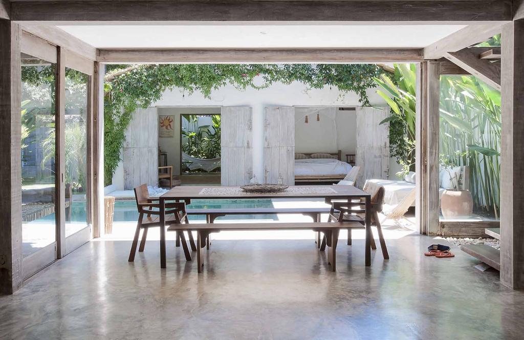 BrazilianBeauty Surrounded by tropical greenery, this laid-back, simply furnished home on the Brazilian coast is one family s serene sanctuary from the bustle of New York Words Jo Caulkett