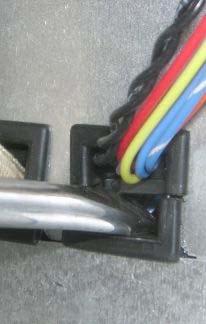 cable held in place by the square strain relief.