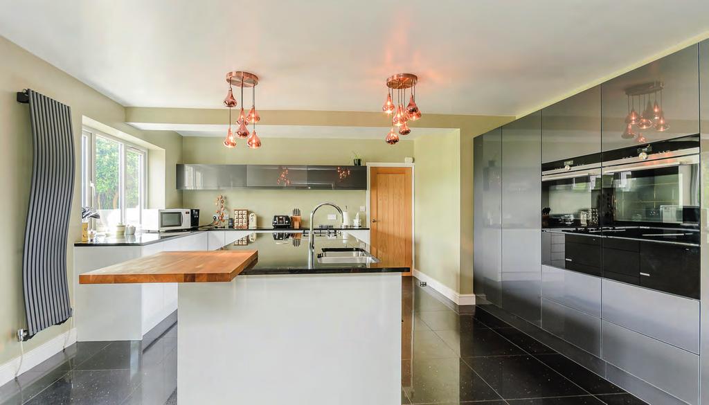 This family home has been sympathetically modernised and improved, not only by extension, décor and fixtures but also including new double glazed units throughout, two new Worcester Bosch boilers