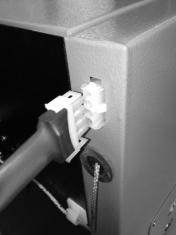 Attach this socket to the side panel of the boiler, as seen in the