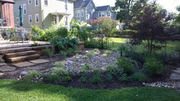 Rain gardens and pervious pavement were designed to capture all stormwater from 90 percent of annual rain events (1.
