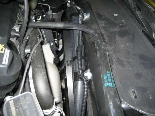 Locate heater hose connection 1.