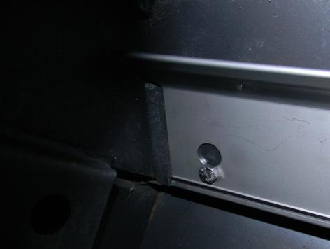 Ensure defector is seated so bolts are situated at the top of the keyhole before tightening.