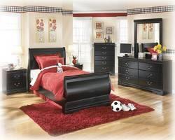 black finish with antiqued pewter colored metal hardware Curvaceous footboard panel and shapely base rails and top moldings on case