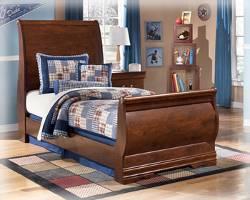 Traditional swinging bail hardware in antique brass color finish Curvaceous sleigh bed with large shaped panels Queen bed also available in this
