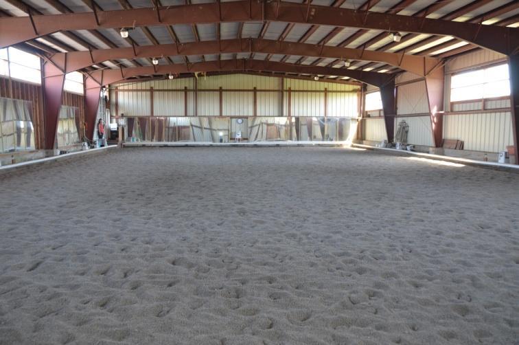 Includes 4 tack rooms and 2 hay storage rooms.