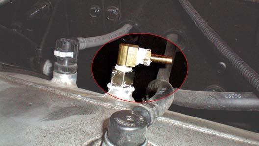 Disconnect the outlet fitting on the motors fuel filter and install supplied check valve with 3/8 hose barb.