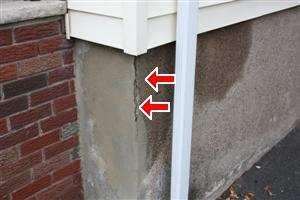Page 57 of 70 (5) Loose parging is cracked and loose around foundation exterior. Loose parging tends to deteriorate quicker due to exposure to moisture and thermal expansion.