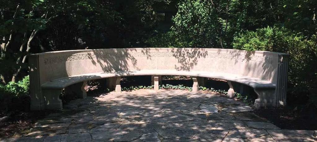 The semicircular bench at the west end of the garden's long east-west axis was cleaned and restored as part of the enhancements.