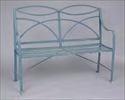 00 Lot #202: ENGLISH BLUE PAINTED CAST-IRON GARDEN SEAT The figure 8 top-rail above arched back rests and with reeded arms, slats, and legs; 38 1/2 in.